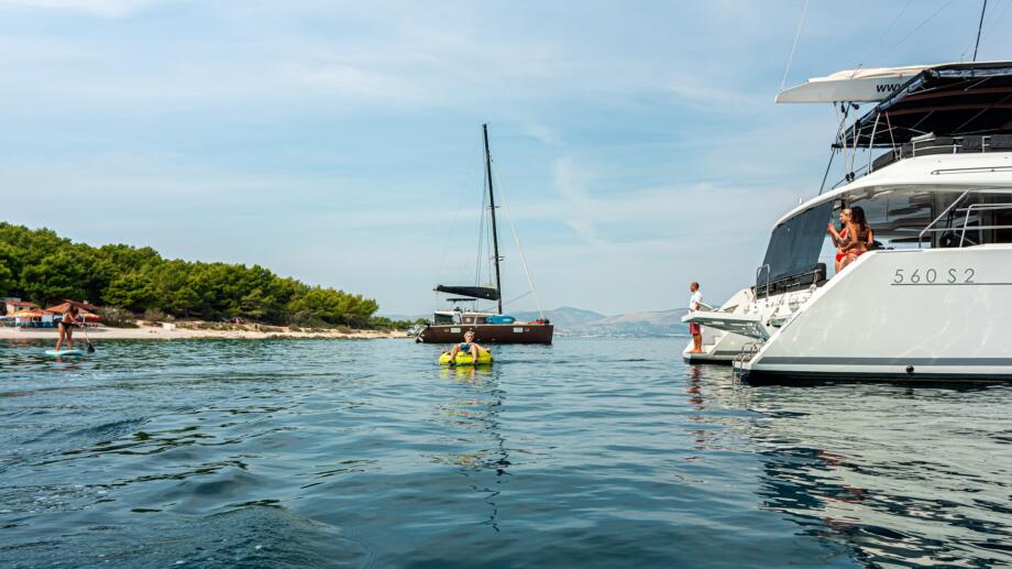 Fun with water toys on board Adventure Sailing Cruise